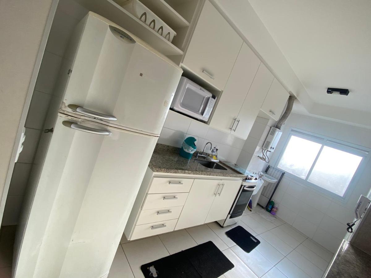 Apartamento encantador com piscina Apartment Guaruja Bagian luar foto