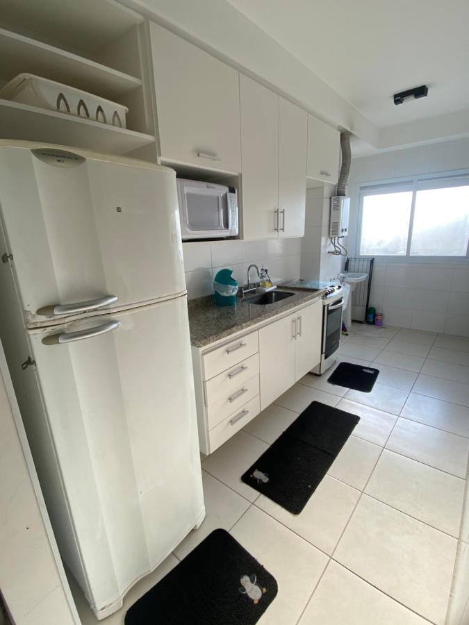 Apartamento encantador com piscina Apartment Guaruja Bagian luar foto